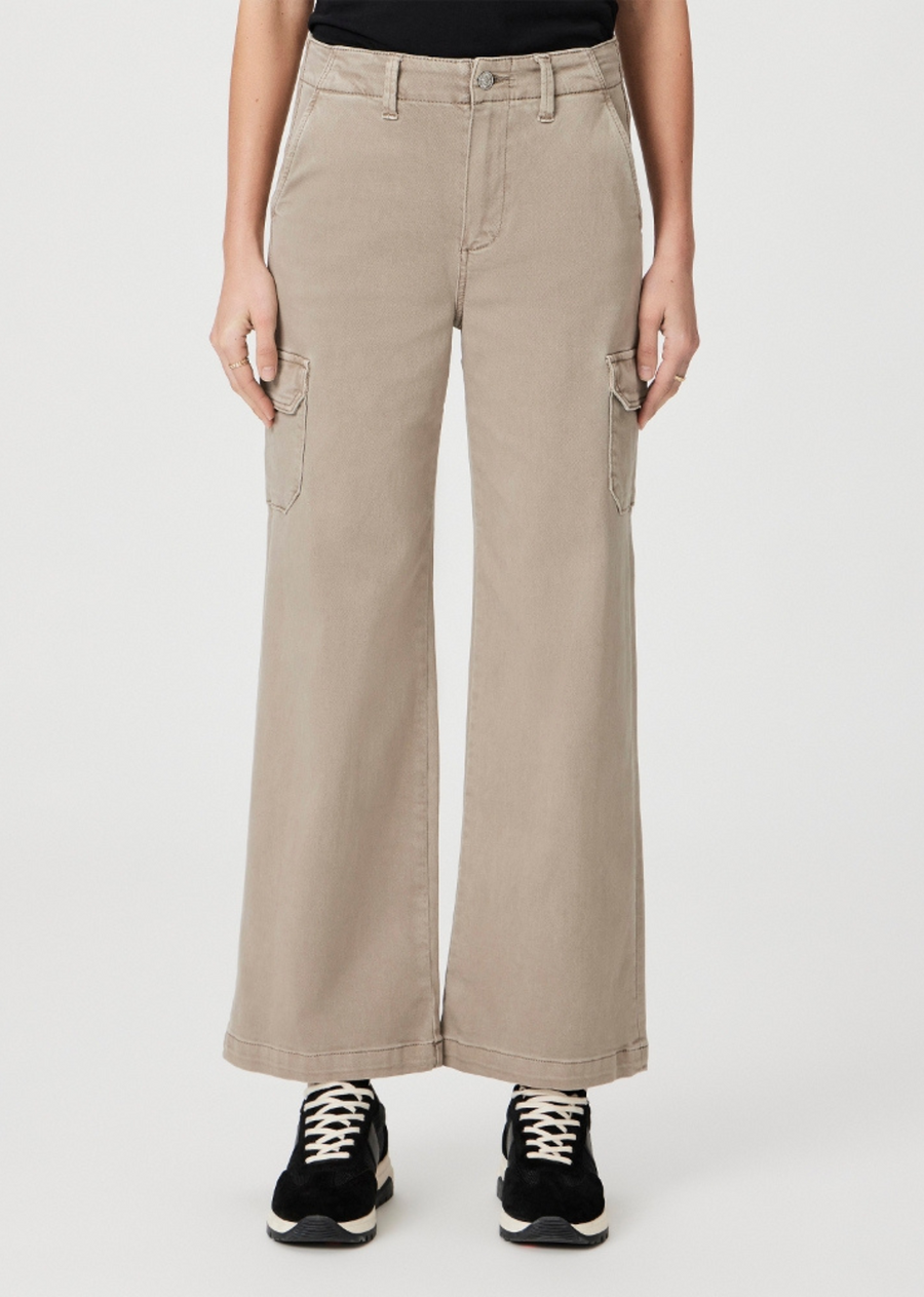 Paige Carly Cargo Jean. The Carly with cargo pockets is our feminine take on the utilitarian trend. This high-rise wide-leg pant comes in Vintage Moss Taupe and has an ankle-length silhouette, slightly slanted pockets, and sleek cargo pockets. This effortlessly cool style will be your new go-to for casual, off-duty days.