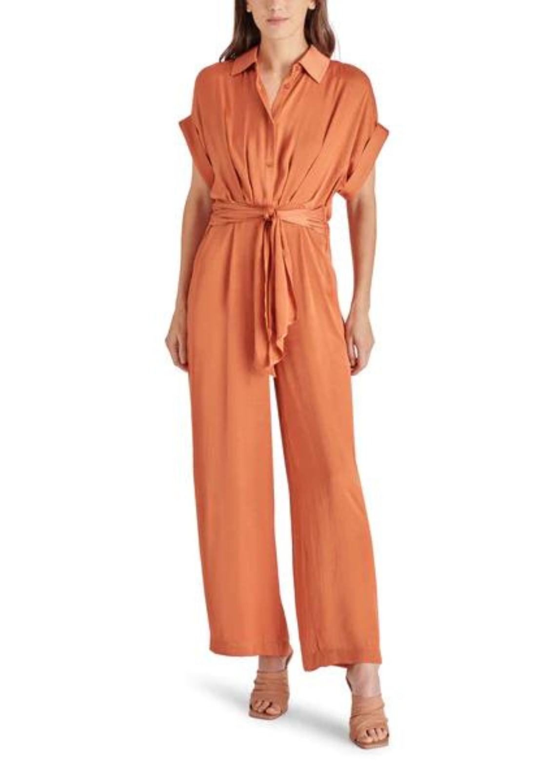 Steve Madden Tori Jumpsuit. Introducing the TORI jumpsuit. This washed satin jumpsuit features a tie front detail, wide-leg pants, and dolman sleeves. With a button front, collar neckline, and rolled sleeves, this jumpsuit is perfect for any season. Elevate your style with this satin beauty.
