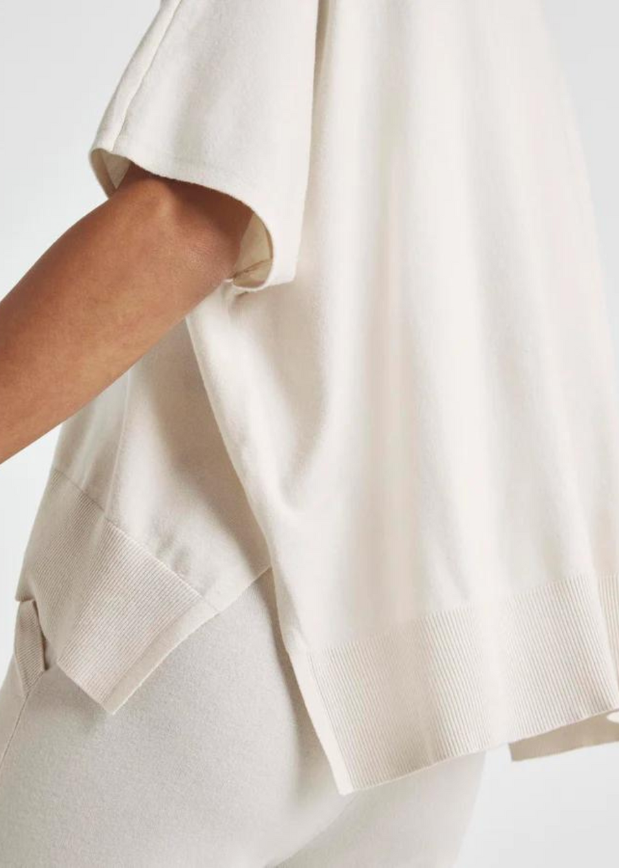 Splendid Veronica Tunic Sweater.The Veronica Tunic Sweater has a cropped, easy fit with a silky smooth hand feel. We love how the boxy relaxed fit pairs with the elevated details like the rib hem and side slits.