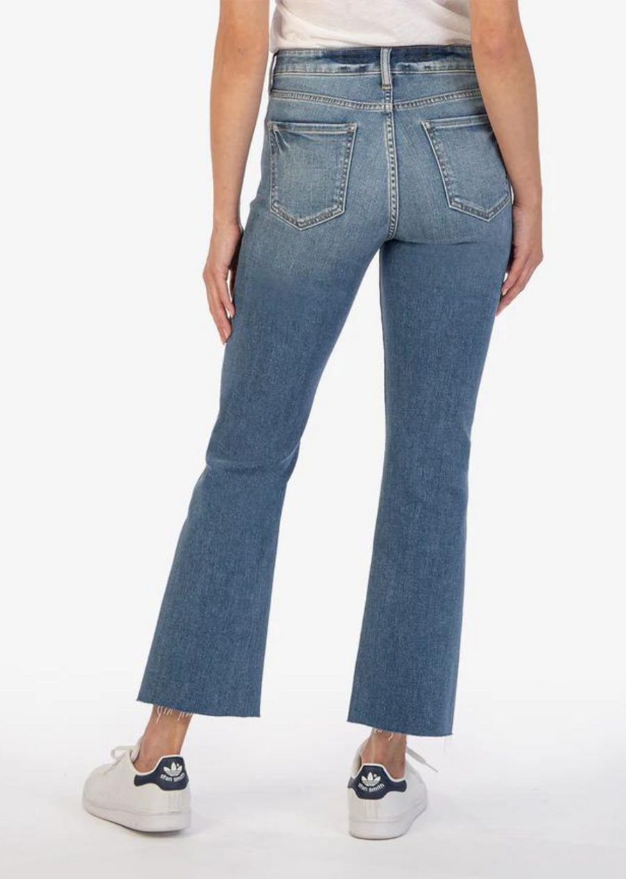 Ankle-grazing raw hems further the vintage-inspired style of stretchy flare jeans cut from stretch denim in a faded wash. Color: Chivalrous Wash  Fit: True to Size, Model is wearing a size 0  High Rise  Stretch Denim  Care: MACHINE WASH TUMBLE DRY LOW   Fabric: 87% Cotton, 12% Polyester, 1% Spandex   Size & Fit: Inseam: 27 1/4", Leg Opening: 17 1/2", Rise: 10 1/4, Silhouette: Crop   SKU: KP1575MB7-CHVSM