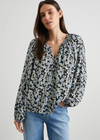 Rails Indi Top. <p><span>The Indi Top makes any outfit pairing look polished, whether it be denim, a midi skirt, or trousers. It's a collarless blouse with voluminous sleeves, natural shell buttons, and a beautiful, 70s-inspired floral print.</span><br><span></span></p> <p>&nbsp;</p>