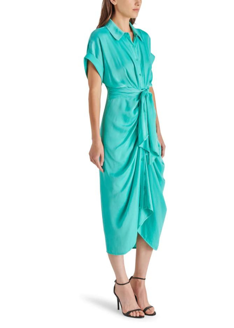 Steve Madden Tori Dress- Blue Turquoise The TORI dress&nbsp;features tailored details like a collared neck and rolled sleeves, finished with a gathered front for a high-low hem effect.