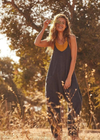 Free People Hot Shot Onesie. This soft and comfy onesie features a slouchy, relaxed-fitting design with a dropped crotch and convenient side pockets.