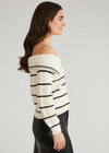 525 America Sierra Stripe Off Shoulder Pullover. Stand out with this stylish pullover featuring a striped design and an adjustable zippered neckline. Customize the off-shoulder look to your preference for a chic, versatile style.