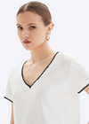 CHRLDR Ava Tipped V-Neck Mock Layer T-Shirt-White. This mock layer t-shirt from CHRLDR&nbsp; is casual comfort at its best. Features a v-neckline, short sleeves and faux layer hem.&nbsp;