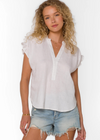 Velvet Heart Avery Linen Top. Exquisitely crafted, the Avery Top showcases a flattering V-neck pop-over style complemented by short ruffle sleeves, adding a touch of femininity. The cinched back ensures a comfortable and effortlessly chic fit.