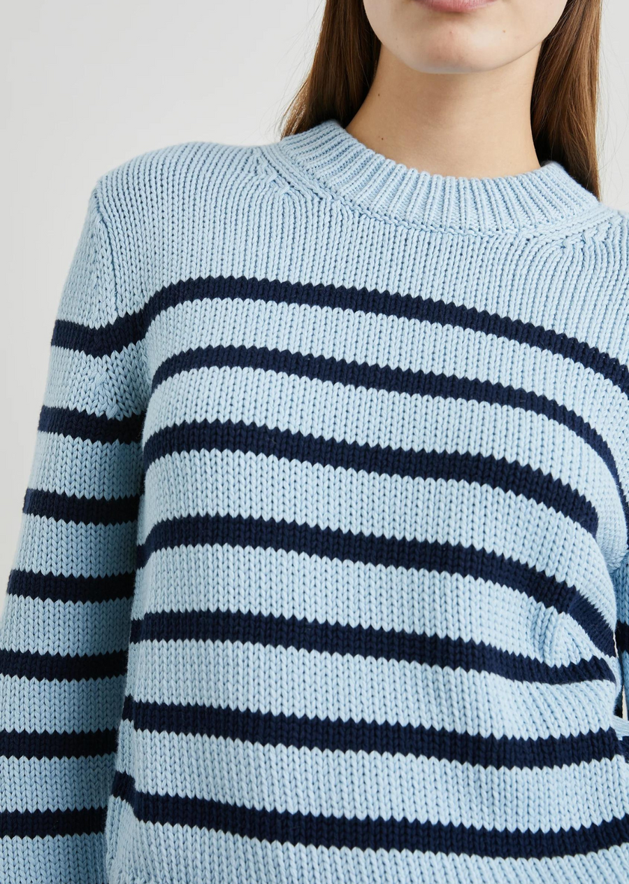 Rails Alise Sweater. The ultimate transitional knit, prepare to wear the Alise year-round. Crafted from 100% cotton yarn, this crewneck is a lighter alternative to your favorite wool sweater — perfect for chillier summer nights or as a layering piece for long winter days. Finished with contrasting stripes on the body and sleeves, the Alise embodies laid-back coastal elegance.