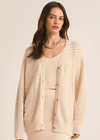 Z Supply Arcadia Pointelle Cardigan. Meet our new cozy relaxed cardigan featuring a charming novelty pointelle stitch, complemented by rib detailing and full-length sleeves for added warmth. With a convenient button-front design, it's the perfect layering piece to effortlessly elevate your look.