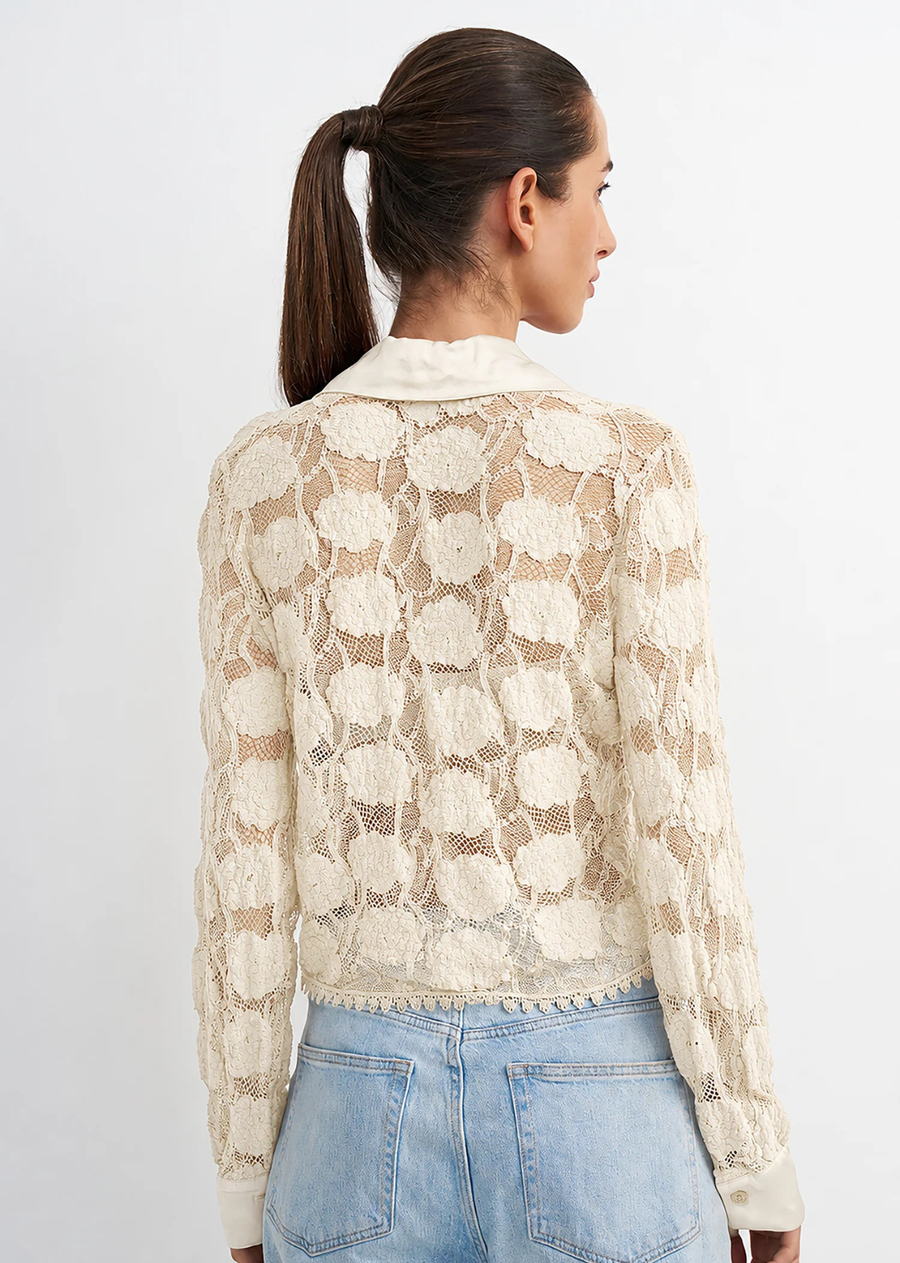 The Heritage Blouse is a feminine blouse designed in a textured black lace. Featuring delicate texture, a feminine finish, and a refined silhouette, it brings a refined western edge to everyday styling. An easy piece to dress up with tailored pants or style as a matching set.