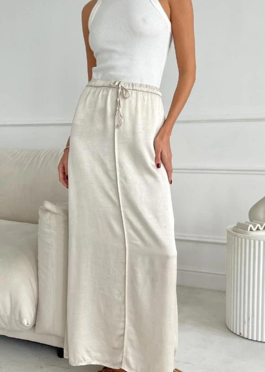 Charli Phoebe Skirt - Pearl. drape making it a perfect elevated essential this season. Versatile to team with any flat this season for a comfortable polished look