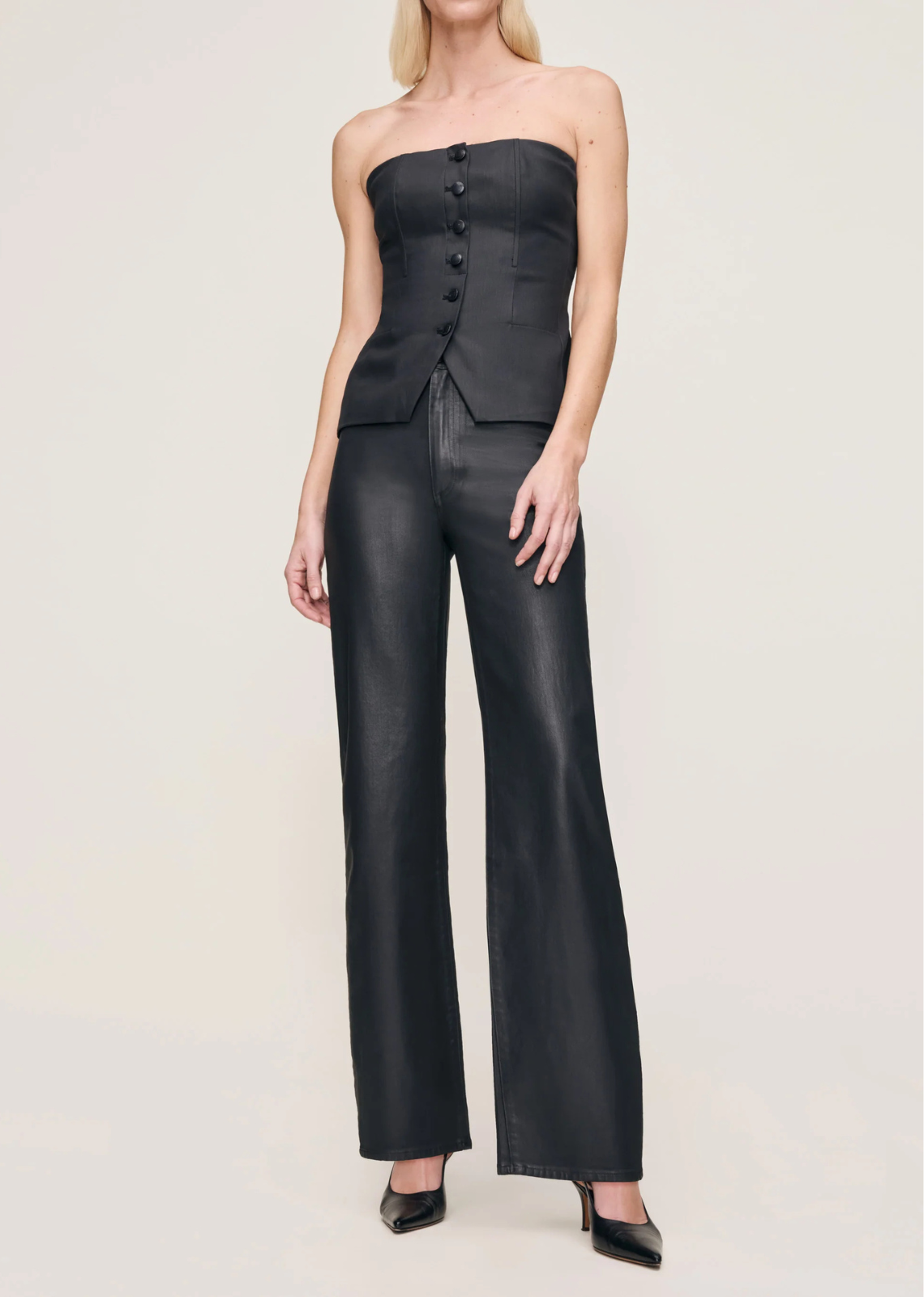 Karmine is a high rise refined wide leg with a 28" inseam. Its straighter leg creates a polished silhouette.

Black Coated is a wax coated, true black denim with a leather-like look. It features black oxide hardware, tonal stitching, a clean hem and a black back patch.