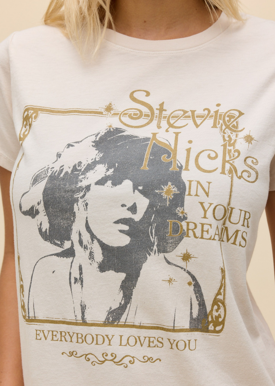 The solo star with instant success. Stevie Nicks' chart topping album In Your Dreams and its track Everybody Loves You are framed with an iconic portrait of the beloved leading lady. Accented with metallic ink.