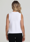 525 America Demi High Crew Neck Tank. Crafted for chic simplicity, its high crew neck adds a touch of sophistication to casual comfort. Perfect for layering or standalone style, pair it effortlessly with skirts or denim for a versatile look.
