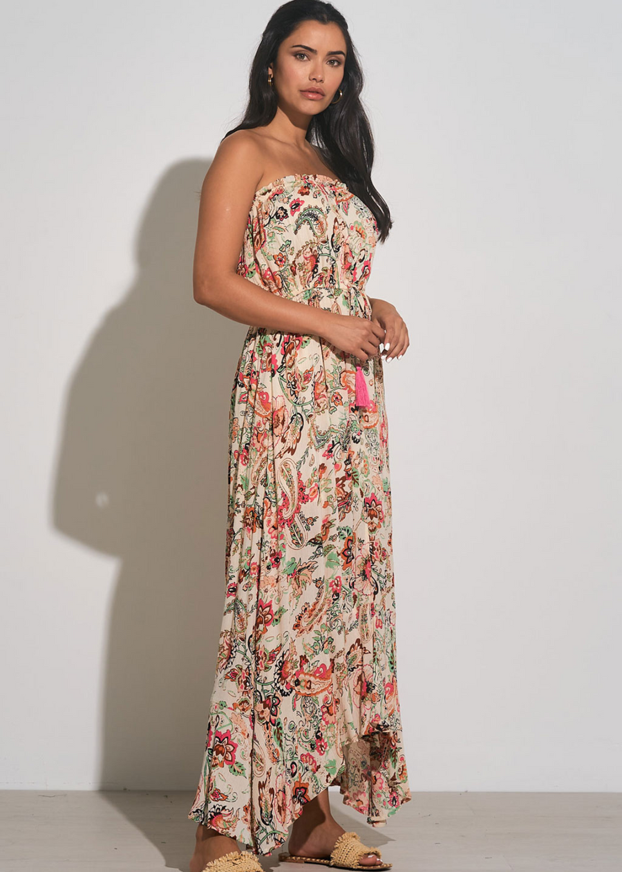 Elan Strapless Maxi Dress- Pink Floral Stand out in this lightweight cotton Elan Strapless Button Up Long Dress. Featuring a floral print, this maxi dress is comfortable yet stylish. The lightweight cotton material makes it easy to wear all day long. This eye-catching dress will be sure to turn heads for any occasion.