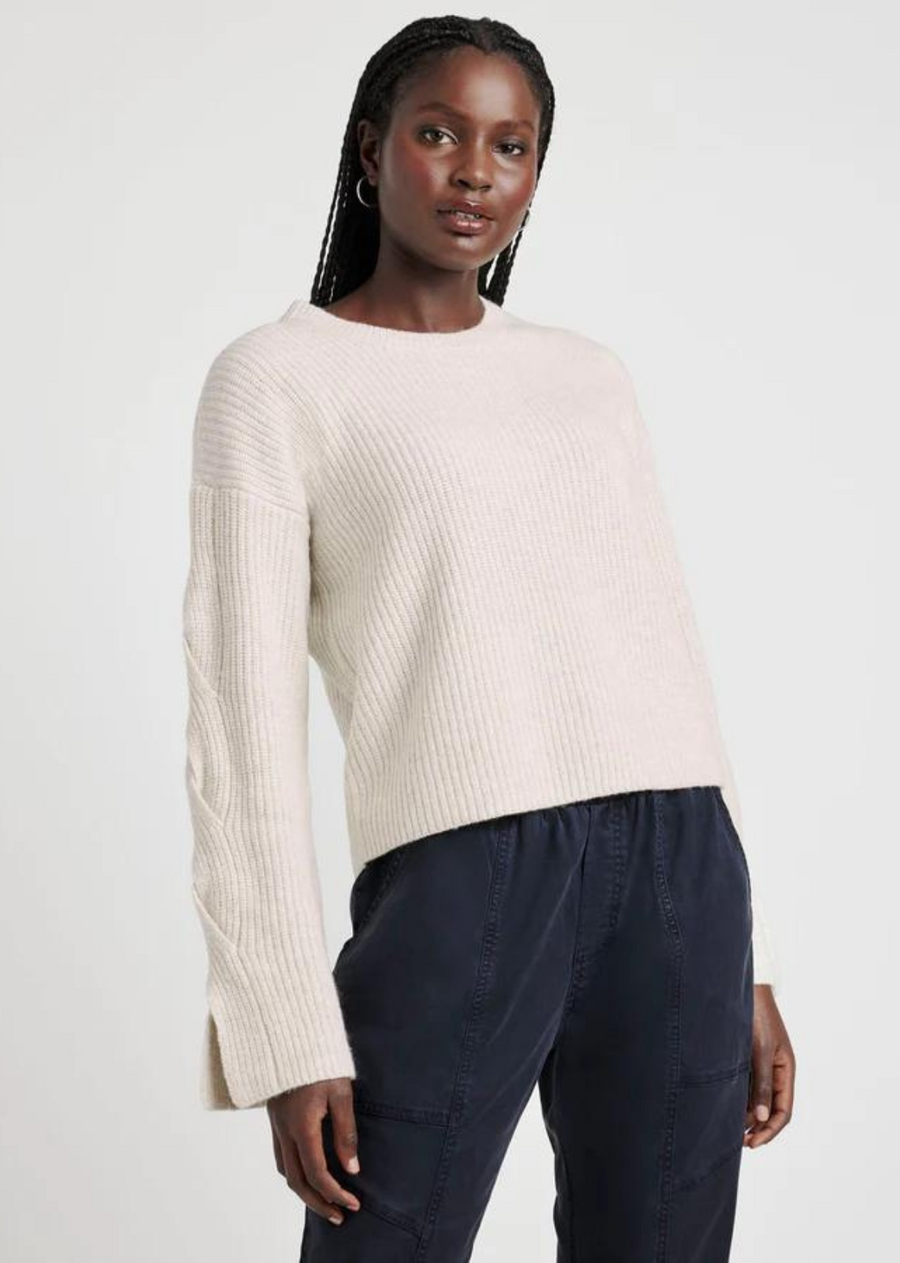 Splendid Elliana Cashblend Sweater. Made from our Cashblend fabrication--a soft blend made with a touch of cashmere-- this ribbed sweater has a laid-back mood with its slouchy shoulder seams and a lovely cable twist detail at the sleeves. It's also slightly cropped so it tops perfectly over high-waisted favorites.