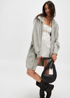 Free People Emmy Cardi. Essential to every collection of layers, this classic cardi is featured in a soft ribbed knit fabrication and slouchy silhouette with button-front closures and a collared-neckline.