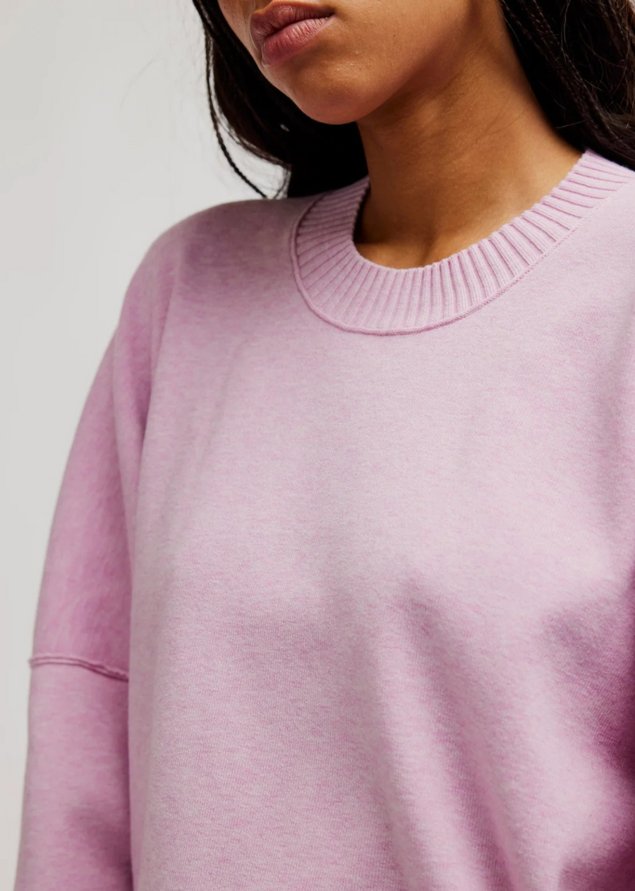 Your new fave wardrobe staple, this essential pullover features an intentionally oversized silhouette and a lightweight knit fabrication for a cozy finish.