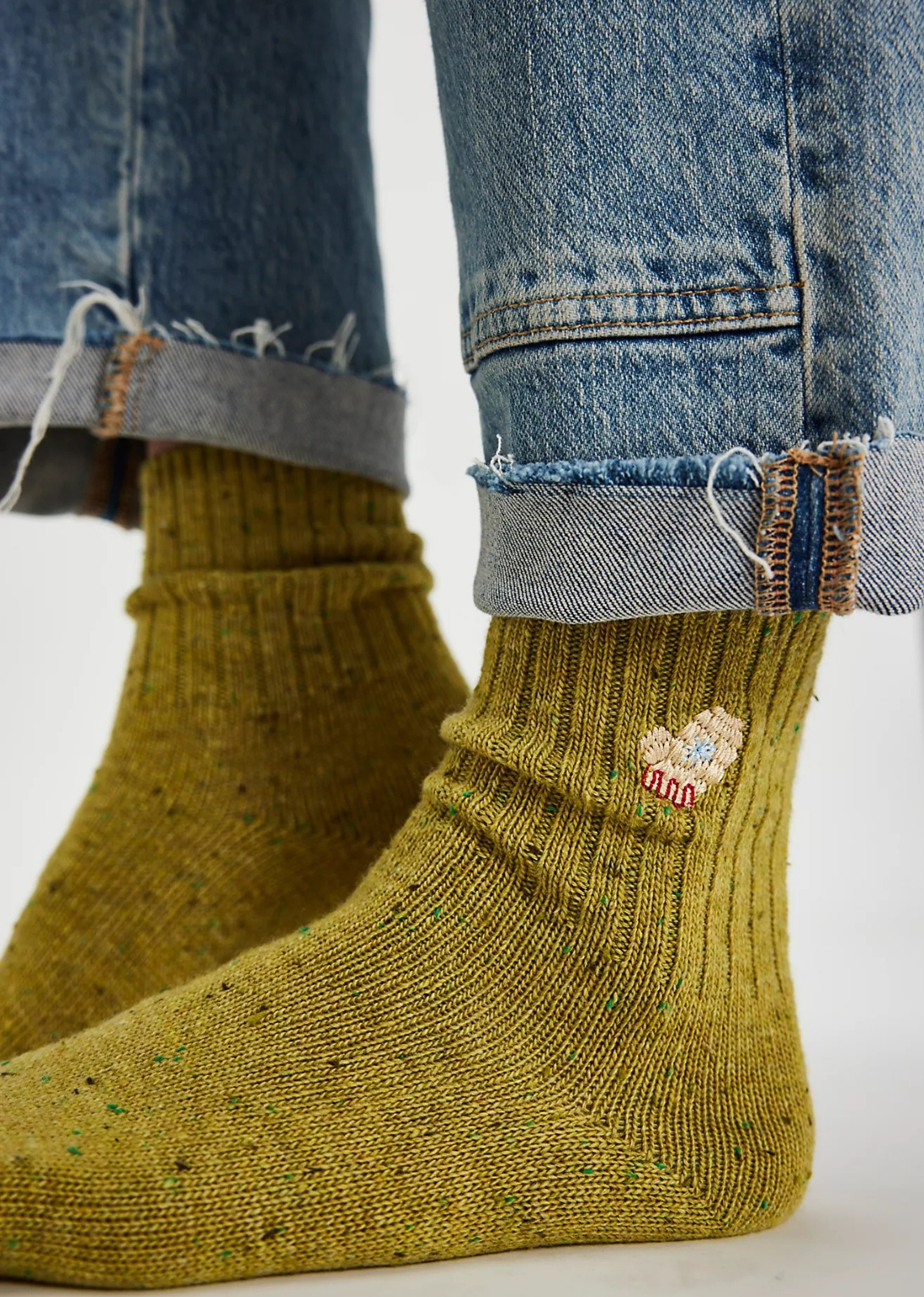 Great for gifting or gracing your own accessories collection, this forever classic sock pack features three pairs of crew style socks designed in a speckled, ribbed knit fabrication with seasonal embroidery at top for the perfect special finish.