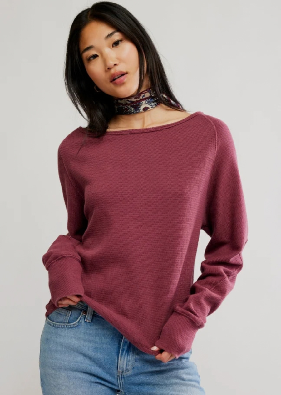 A cozy base for endless outfitting, this long sleeve from We The Free is featured in a thermal fabrication with a flattering boat neckline and slouchy dolman sleeves.