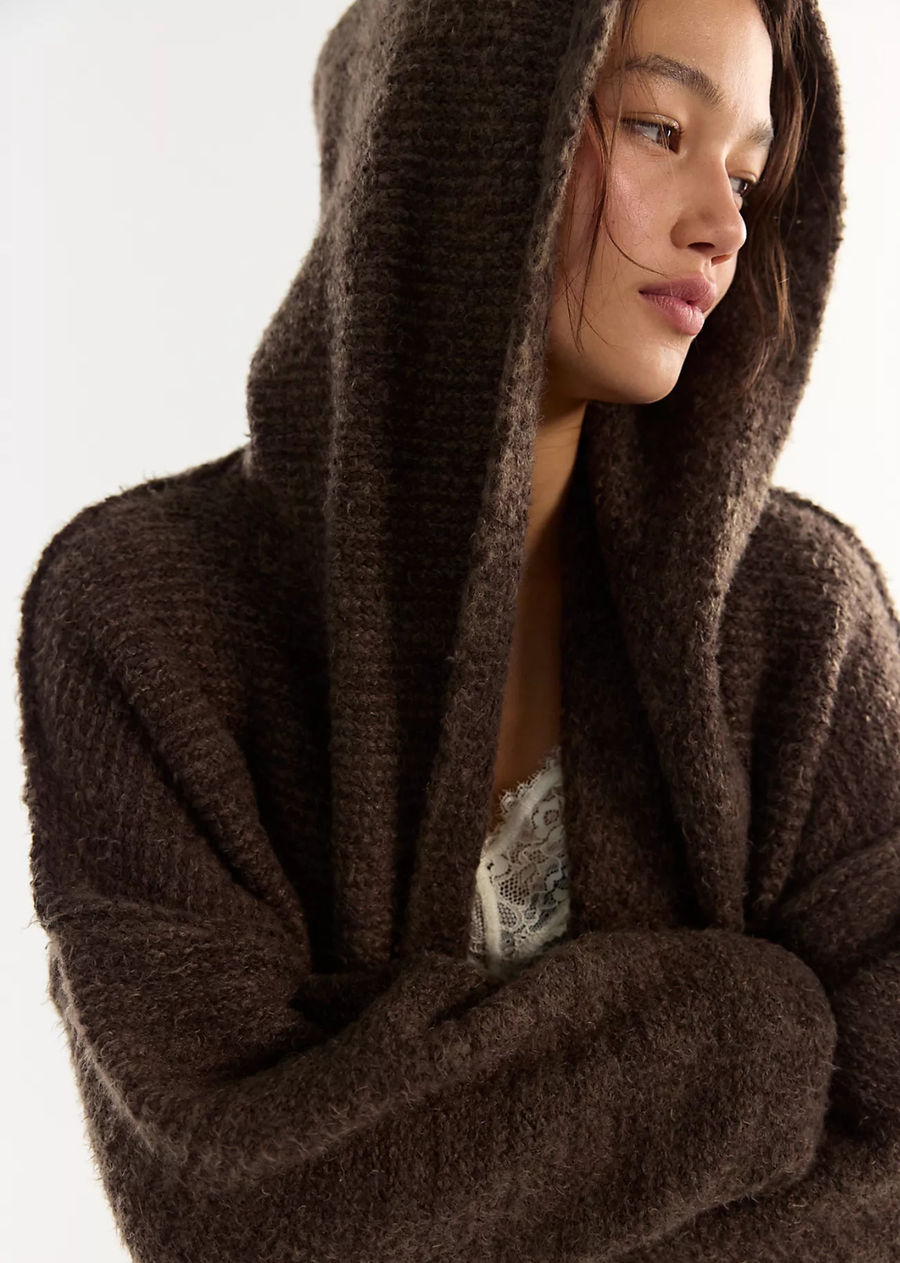 Effortlessly comfy, this slouchy cardi is crafted from a soft, textured cotton-blend yarn with a breathable feel and textured finish. It features an oversized silhouette, a plush marled knit, and dropped shoulders for added coziness.