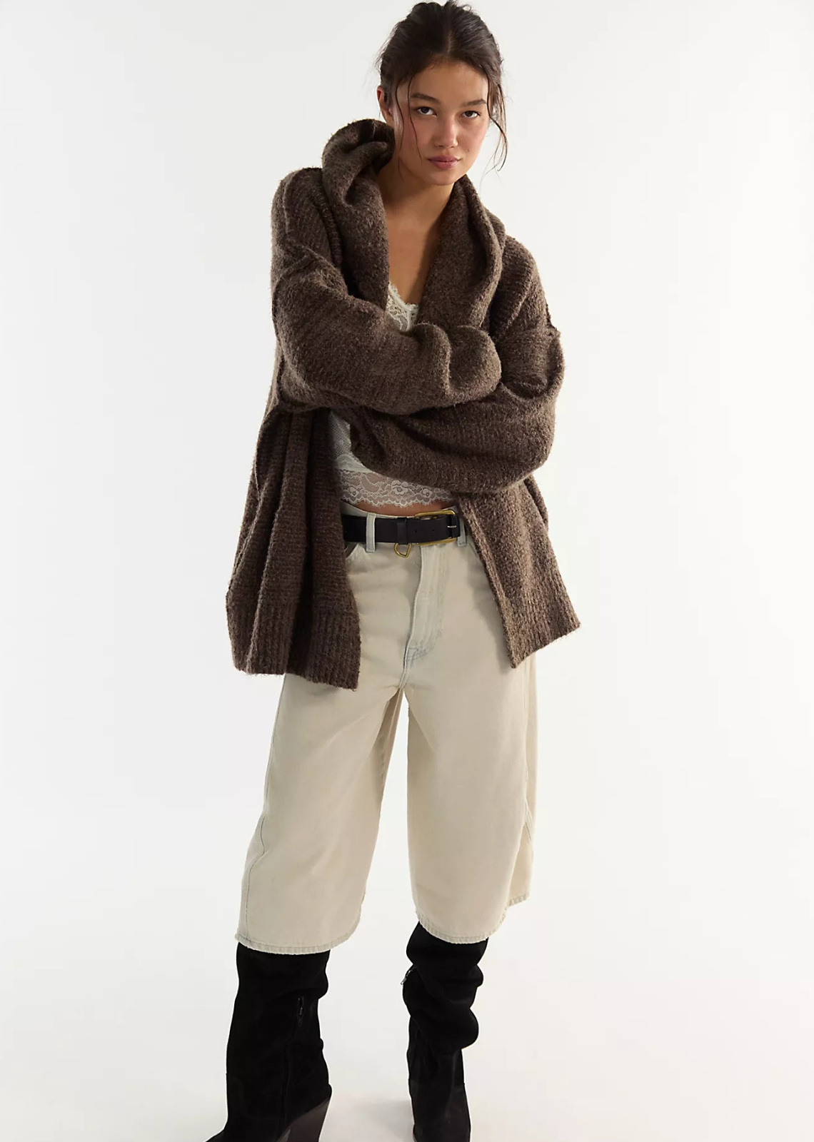 Effortlessly comfy, this slouchy cardi is crafted from a soft, textured cotton-blend yarn with a breathable feel and textured finish. It features an oversized silhouette, a plush marled knit, and dropped shoulders for added coziness.
