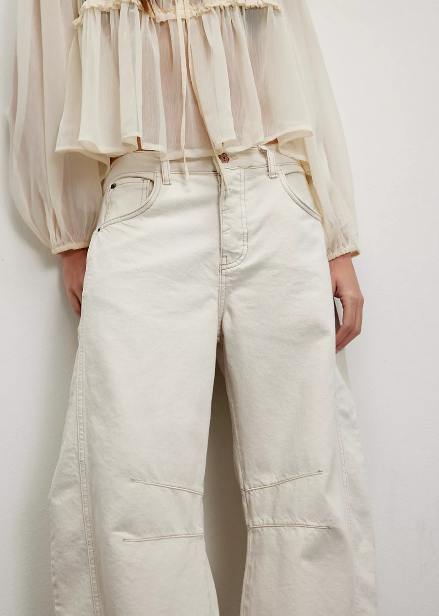 Description:&nbsp;

So bold barrel jeans from our We The Free collection featured in a mid-rise fit with subtle distressed detailing and wide-legs that taper at the ankle.

Additional Information:&nbsp;

Fit:&nbsp;Mid-rise, slouchy, relaxed fit, wide-legs, ankle-length; this style runs slightly large so we recommend sizing down one size
Features:&nbsp;Button closure, rigid denim fabrication, belt loops at waistband, 4-pocket style, subtle distressing, tapered bottom hem, seam detail throughout
Why We ❤ It:&