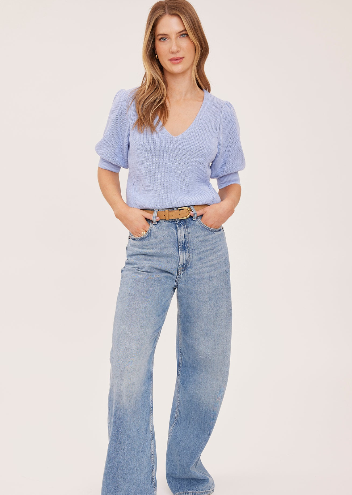 Made of a super soft yarn, the Phoebe sweater features a v-neckline and puff sleeves. It’s effortlessly feminine and perfect for everyday wear.