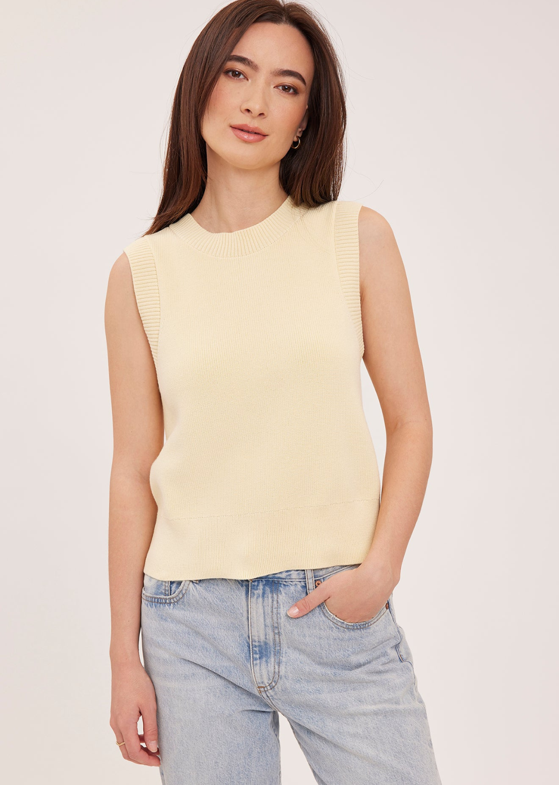 The Skylar vest is made of a soft yarn in a half cardigan stitch. Features include a crew neckline and relaxed fit for an effortless look.