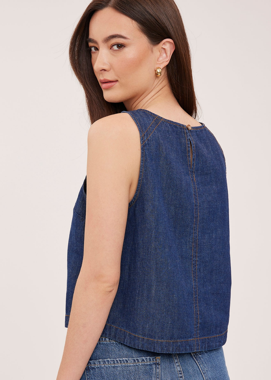 The Blaise tank is made of a denim fabric that has been specially washed for a perfectly lived-in look. Features include contrast topstitching details and back keyhole closure.