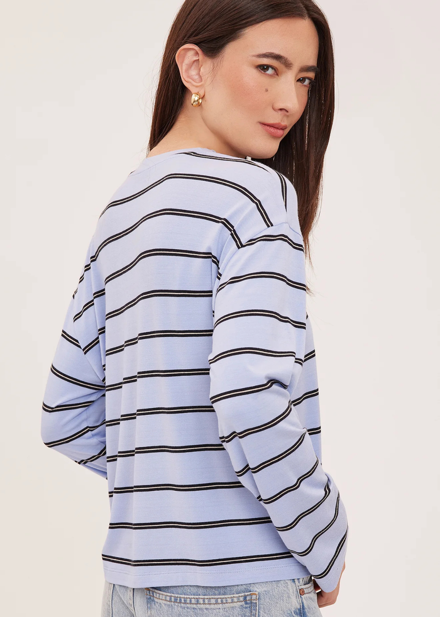 The Indy top is made of a soft rayon jersey fabric. Features include a crew neckline and side slits.