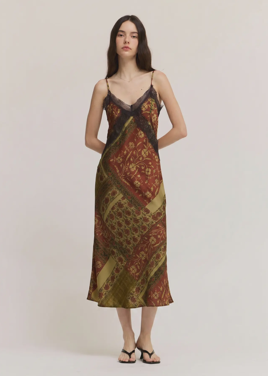 Meet the Gia Midi Satin Dress, an effortless slip silhouette designed with a touch of feminine detail. Crafted in a smooth satin fabric, this sleeveless midi dress features a flattering V-neckline, delicate lace trim, and adjustable straps for a comfortable, customizable fit.

Finished in the same signature Gia print as the matching Gia Balloon Pant, this dress brings an elevated yet easy feel to your fall and winter wardrobe. Perfect for everyday wear, dinner dates, nights out, and special occasions.