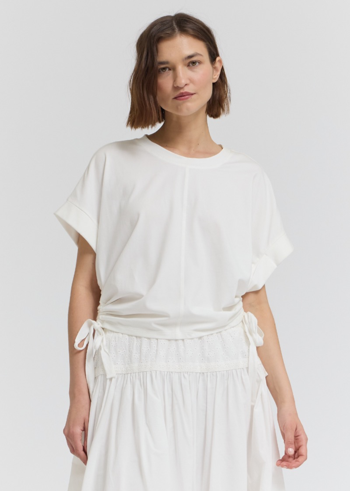 Add a flattering twist to your everyday basics with this side scrunch tee. Designed with adjustable ruched detailing along the side, it creates a beautifully contoured silhouette while offering a comfortable, easy fit.