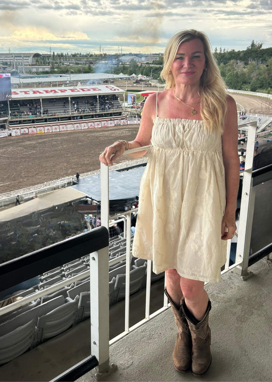 Effortlessly feminine with a touch of vintage charm, this embroidered spaghetti strap babydoll dress is made for sunny days and special moments alike. Designed in a soft cream hue, it features delicate embroidery that adds beautiful texture.