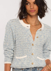 Heartloom  Sol Sweater. The Sol Cardi is made of our soft melange yarn and has a relaxed fit with contrast ribbed edges. It has gleaming novelty buttons along the bodice and pairs perfectly with your favorite cut-offs.