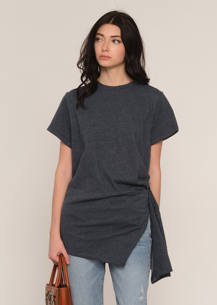 The Simona Top is a cool, relaxed fit t-shirt. It has a crew neck and an asymmetric, draped hem.