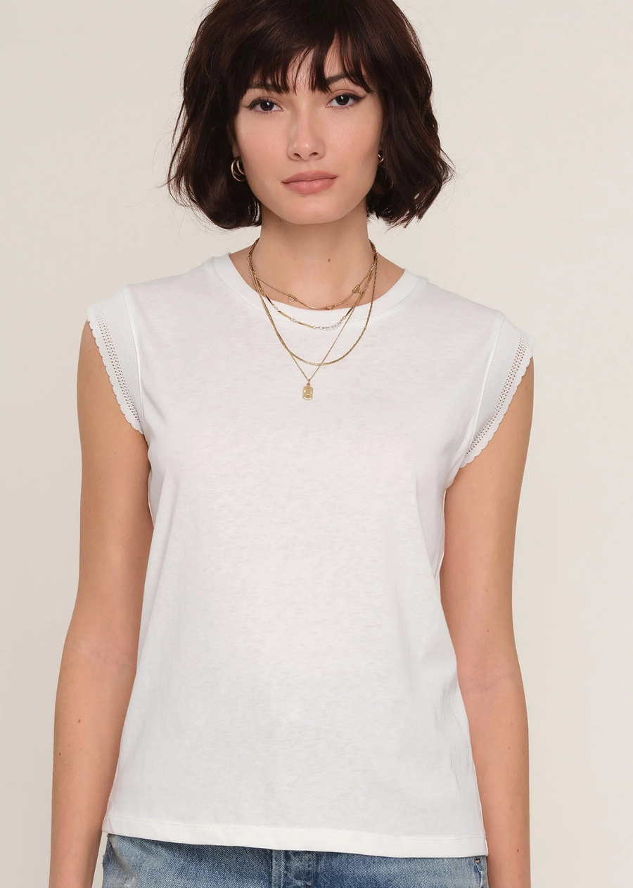 The Francesca Top is a cool, relaxed fit, sleeveless top made from a soft jersey. It features a delicate lace trim along the armhole.