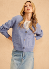 John & Jenn Braxton Cardigan- Blue Nova.The Braxton cardi from John + Jenn is a stylish addition to any wardrobe. It features a 3-button closure, slightly cropped boxy fit and two front pockets. This cardigan is designed to provide a comfortable and flattering fit.