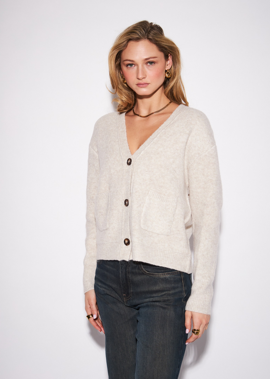 A polished everyday cardigan with a timeless, tailored feel, the Braxton features a classic V-neckline and button-front closure&nbsp;framed by a softly relaxed silhouette. The clean construction makes it an effortless layering piece, while the refined knit gives it&nbsp;enough polish to wear beyond casual dressing. Button it up and pair with wide-leg denim for an easy everyday look, or layer it&nbsp;over a crisp shirt with tailored trousers for a more elevated finish.