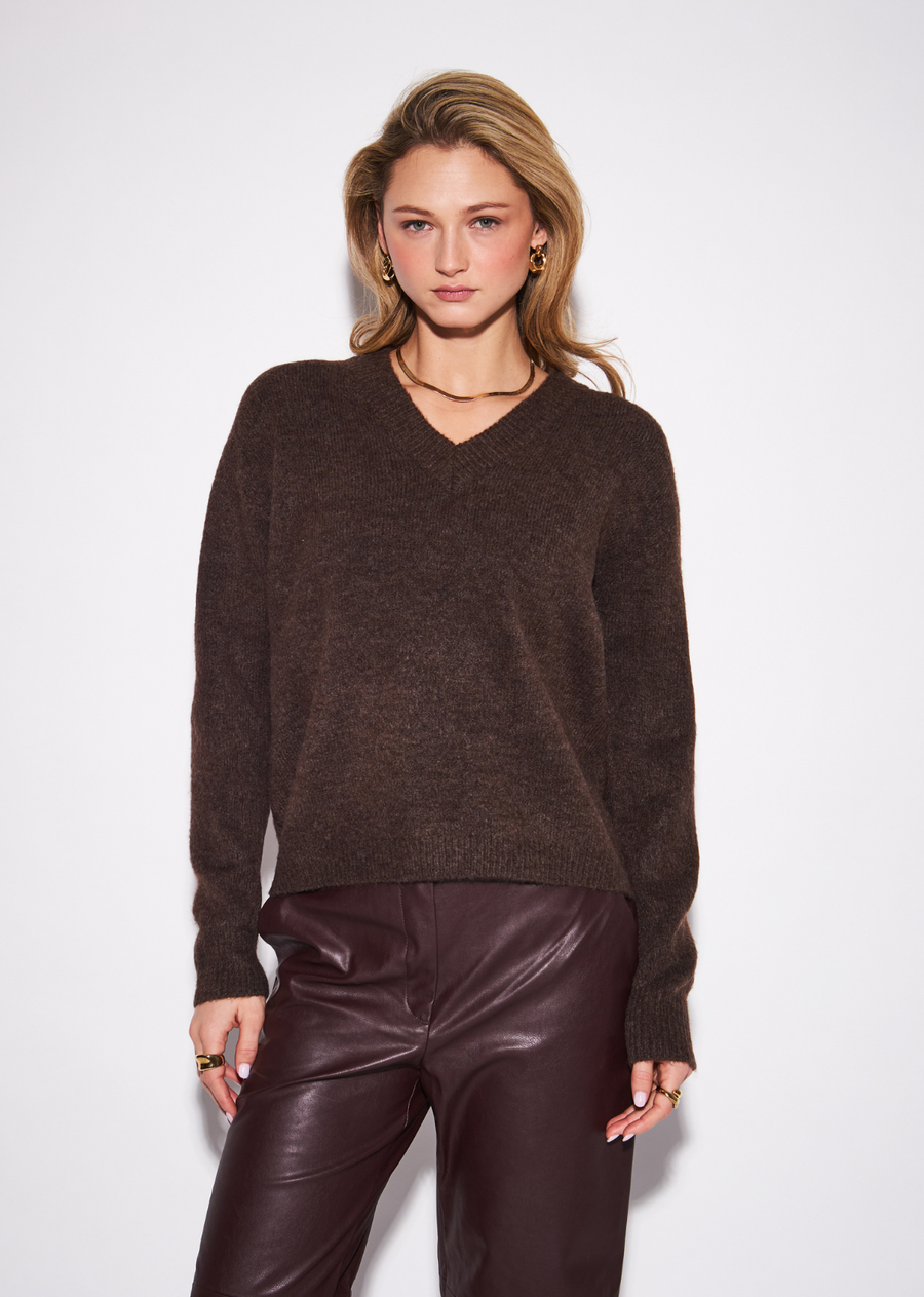The Charlie brings an easy, timeless sensibility to the classic V-neck sweater. Cut with a relaxed shape and clean neckline, it&nbsp;offers a polished foundation that can move seamlessly through the season. Wear it loose with denim and boots for effortless&nbsp;everyday dressing, or tuck it into tailored trousers with loafers for a more refined take. Simple, versatile and easy to layer, it is the&nbsp;kind of knit that earns a permanent place in the wardrobe.