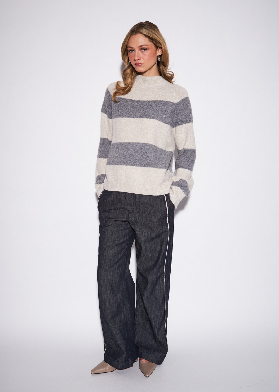 The Edison makes a statement through bold horizontal striping and a softly textured knit surface. Its relaxed crewneck silhouettekeeps the graphic design wearable, while the dimensional finish gives it a richer, more elevated feel. Let the stripe take center&nbsp;stage with simple denim and boots, or dress it up with tailored trousers and loafers for a polished take on statement knitwear.