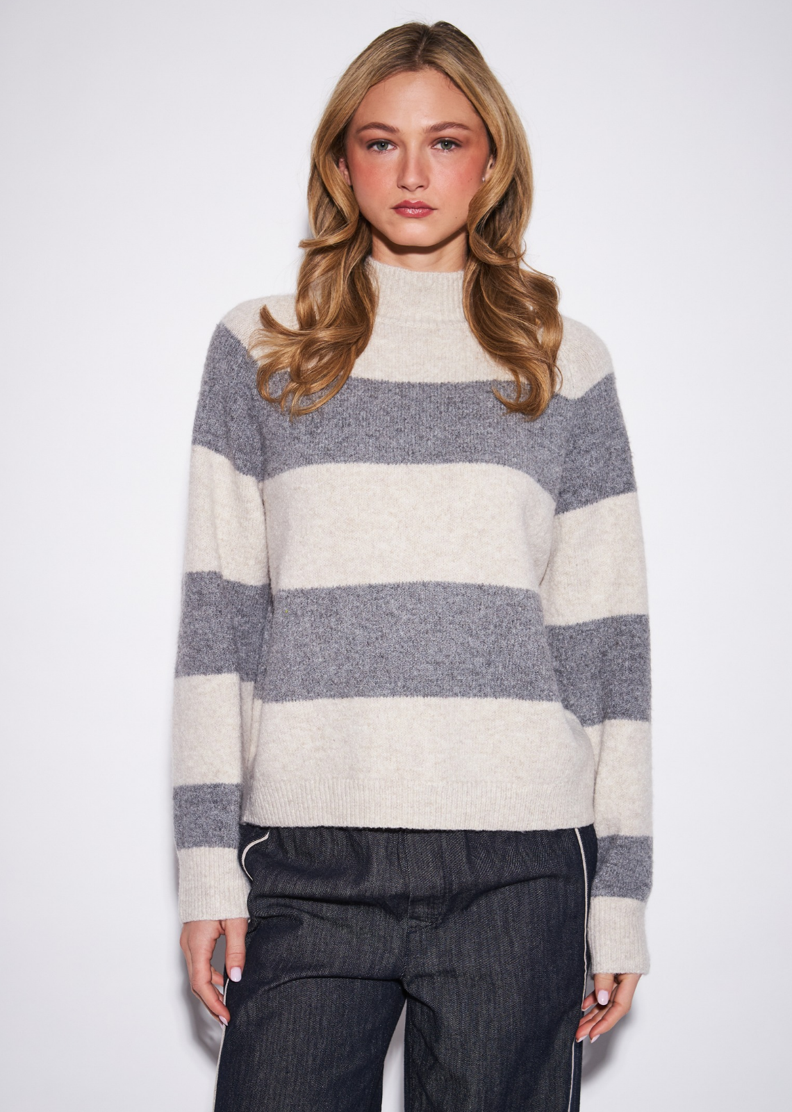 The Edison makes a statement through bold horizontal striping and a softly textured knit surface. Its relaxed crewneck silhouettekeeps the graphic design wearable, while the dimensional finish gives it a richer, more elevated feel. Let the stripe take center&nbsp;stage with simple denim and boots, or dress it up with tailored trousers and loafers for a polished take on statement knitwear.