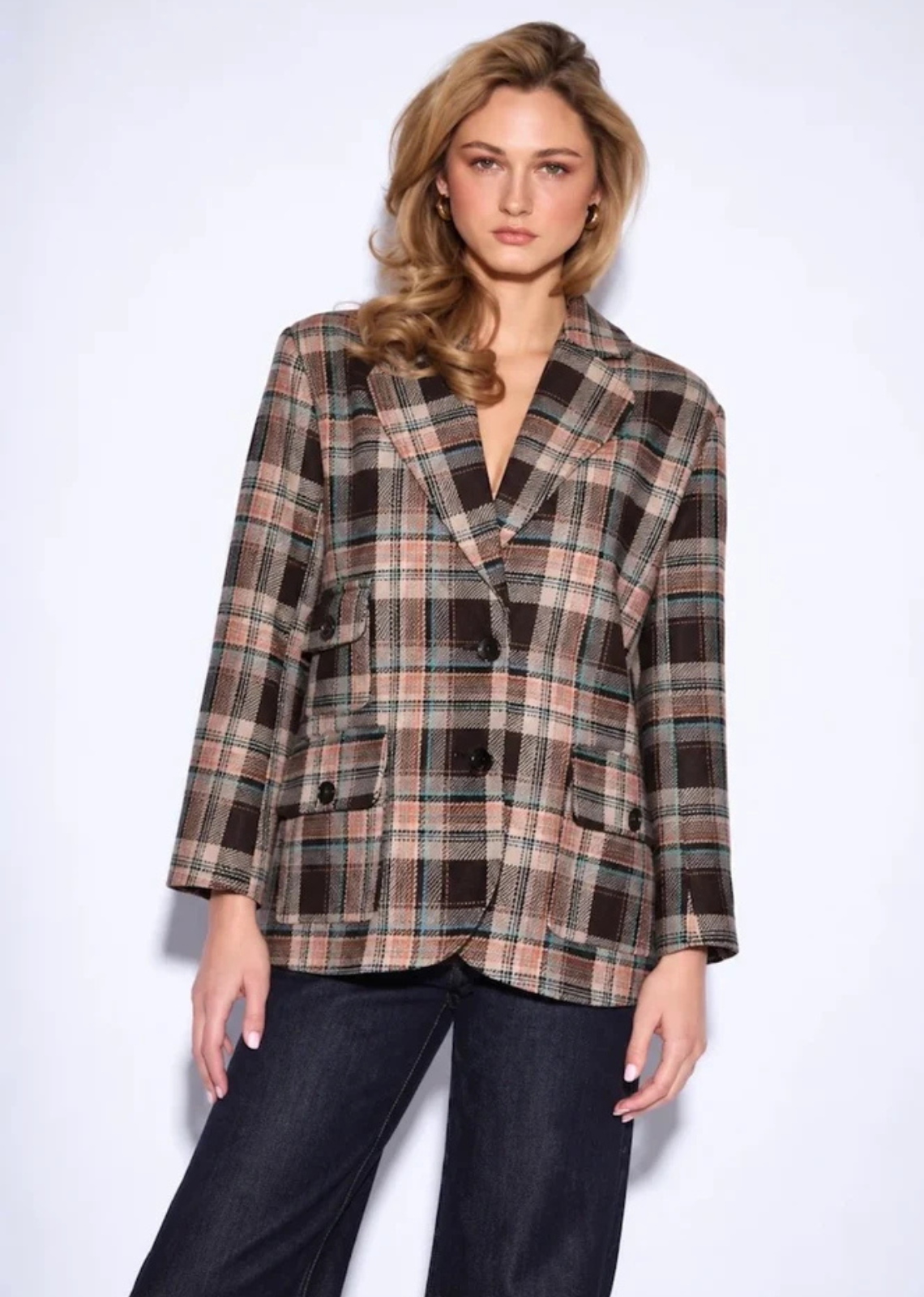The Walter combines classic tailoring with unmistakable heritage character. Its structured silhouette is elevated by an all-over&nbsp;tartan pattern and rich wool-blend construction, creating a polished statement that feels both traditional and modern. Wear it with&nbsp;denim and boots to break up the tailored feel, or pair it with coordinating trousers for a more directional, head-to-toe look. A&nbsp;standout piece for bringing pattern and structure into the fall wardrobe.
