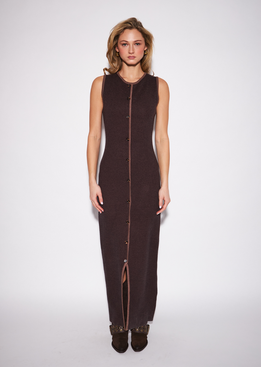 The Nicky is a refined button-front cardigan style dress with a softly fitted silhouette and subtle textural dimension. Its polished proportions allow it to be worn as both a standalone dress and an effortless layering piece, making it particularly versatile through the transitional months.&nbsp;