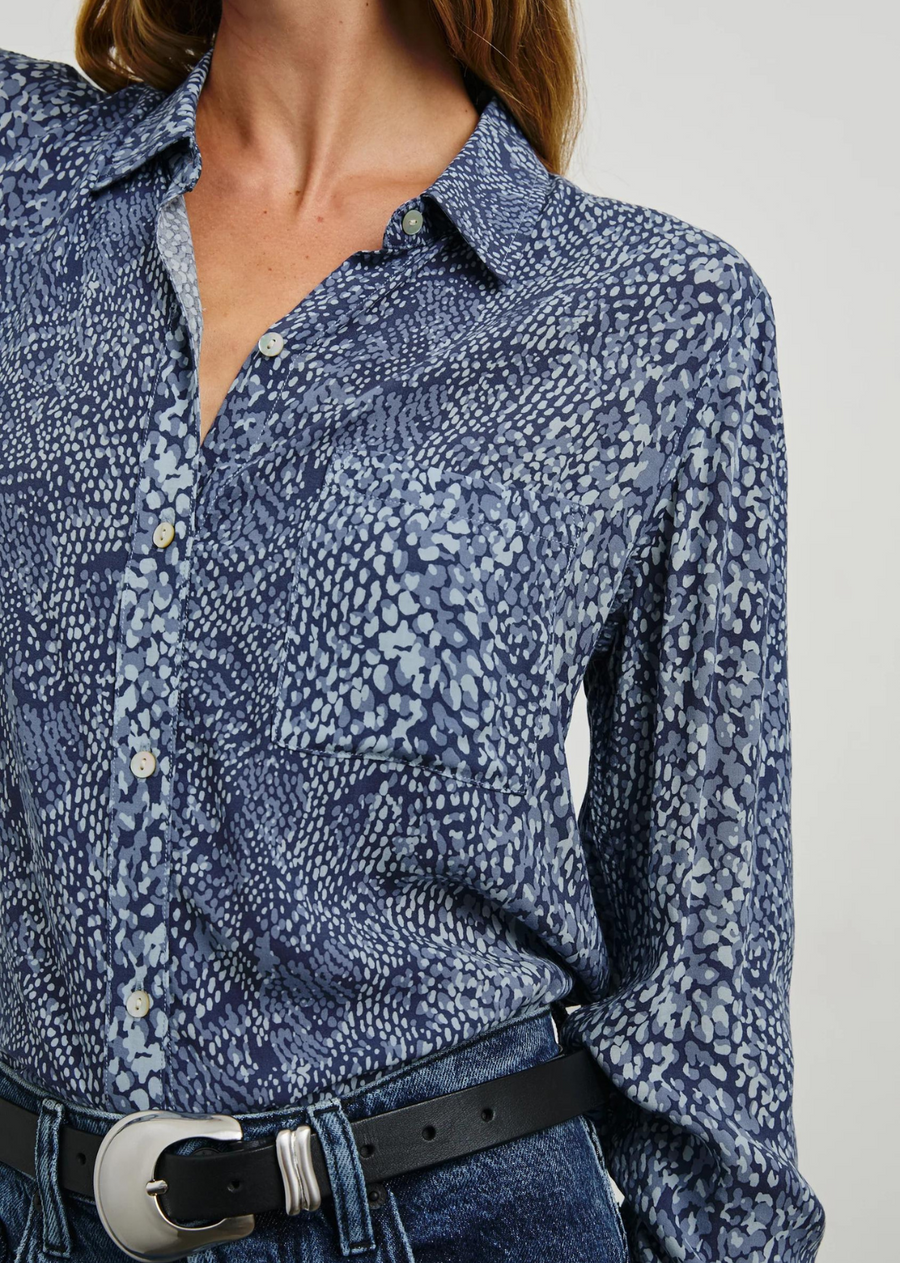 Rails Josephine Shirt- Navy Python. Consider the Josephine Shirt a foundational piece for your wardrobe. The blue python printed button-down is crafted with a classic fit and super soft, featherweight rayon. Finished with premium touches like a crisp collar, chest pocket, and natural shell buttons, the Josephine effortlessly elevates your essentials.