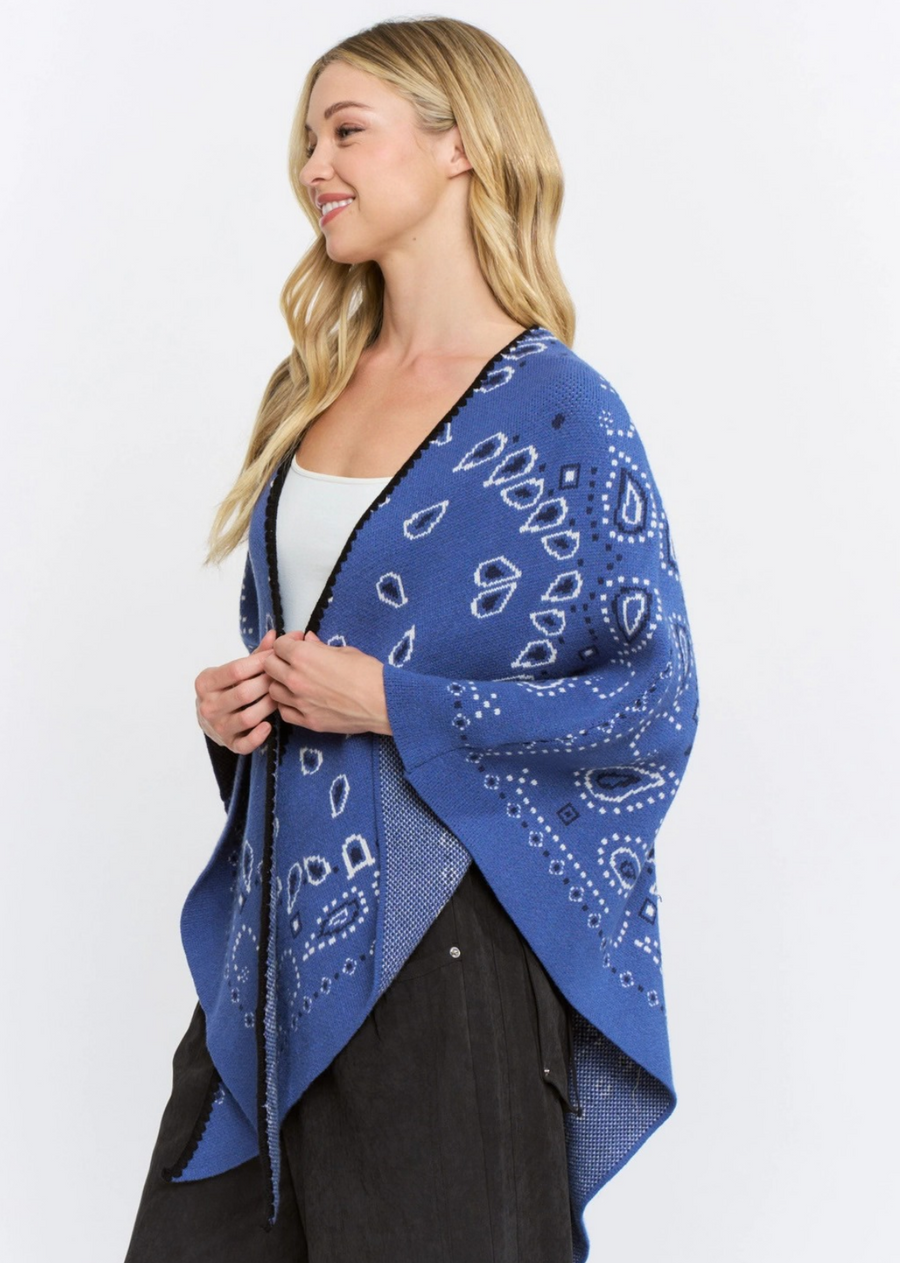 Elevate your corporate attire with this sophisticated blue open-front kimono cardigan, meticulously crafted for the discerning professional.

The refined jacquard fabric features an intricate pattern in rich blue and crisp white tones, offering a distinguished appearance suitable for both executive settings and after-work events. Designed with versatility in mind, this kimono seamlessly transitions from boardroom presentations to off-duty engagements.
