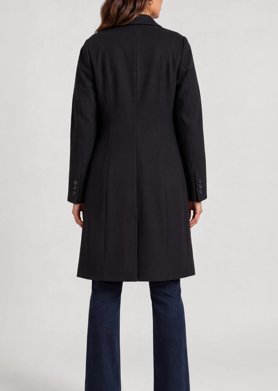 Part blazer, part coat, entirely polished. This longline ponte knit layer combines comfortable stretch with tailored details, including notched lapels, a two-button front, flap pockets, and flattering seaming. Wear it with everything from denim to trousers.