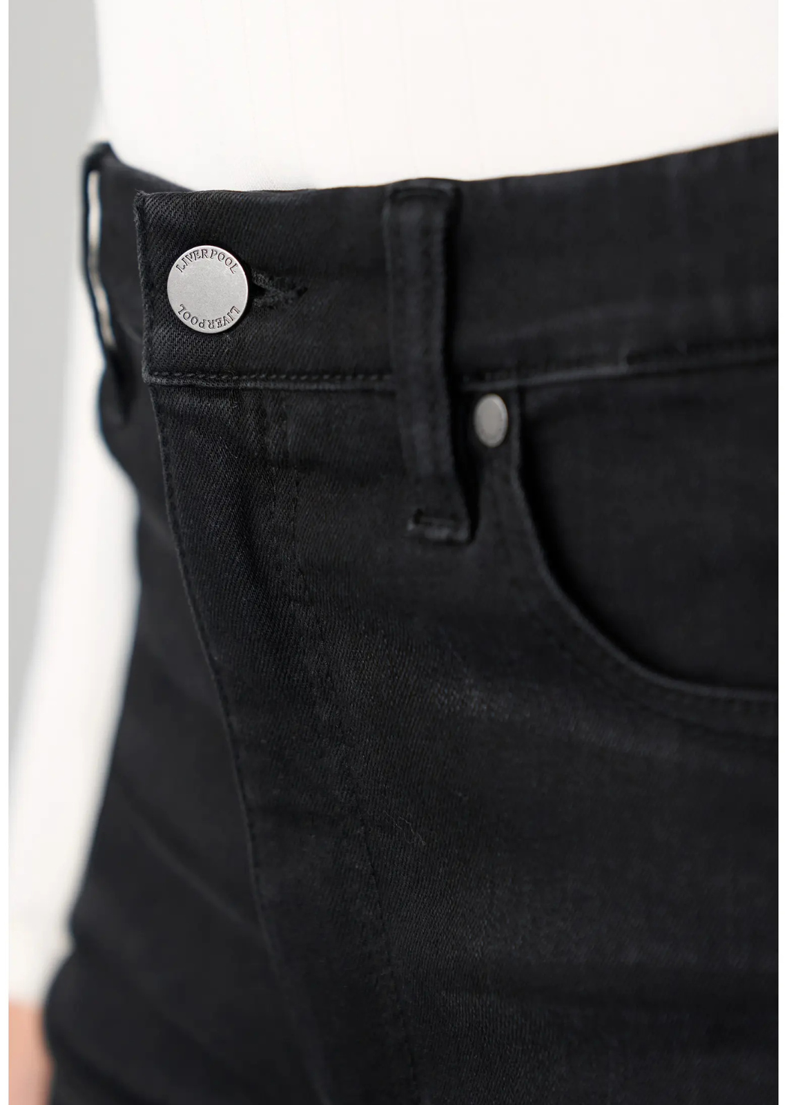 High-rise slim jeans in lightweight stretch denim with a comfort waistband, vintage-inspired faded wash, classic five-pocket styling, zip fly, and 29-inch inseam.