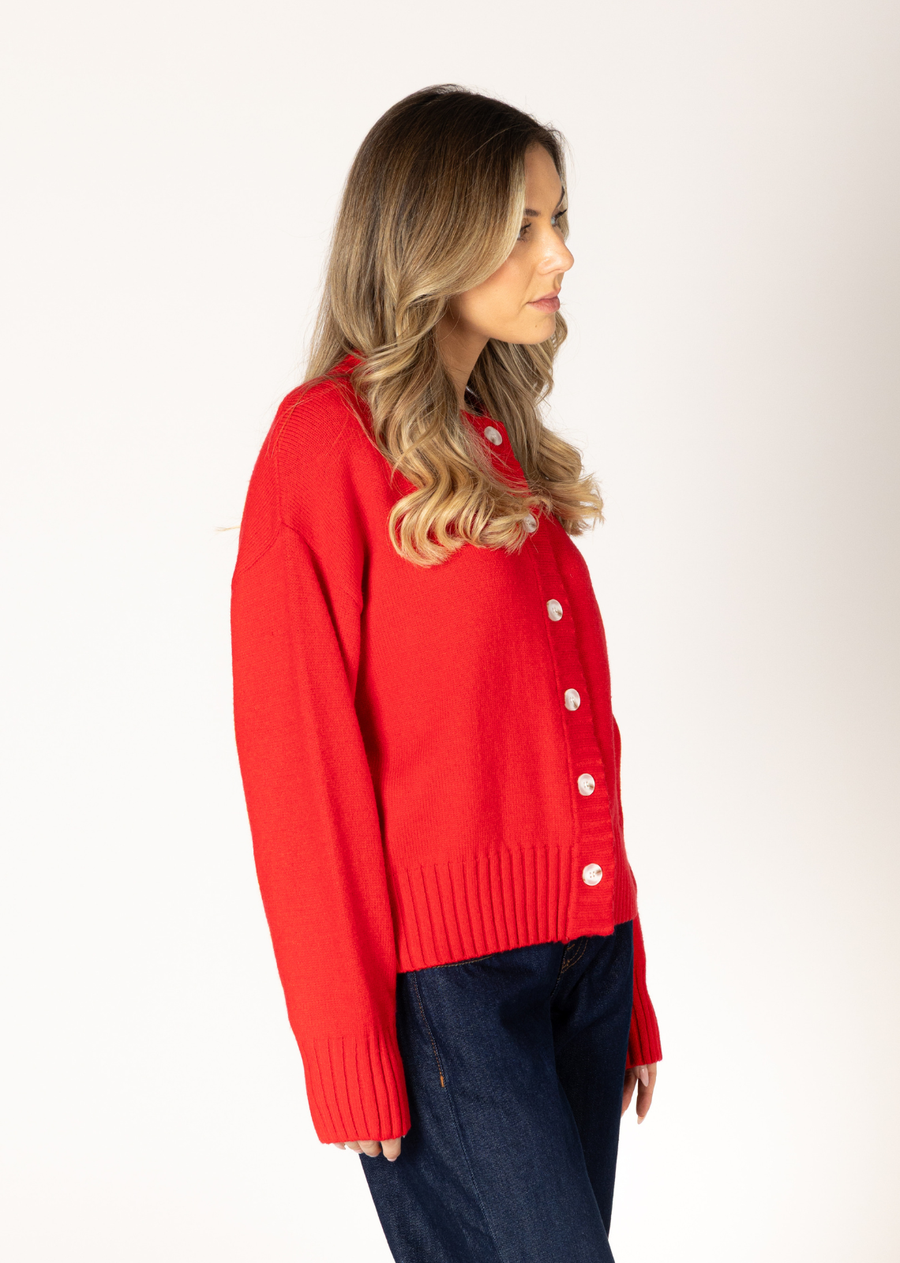 The Beau sweater is the perfect blend of cozy and sophistication. With charming ribbed detailing with buttons and a classic crew design, this sweater is timeless.