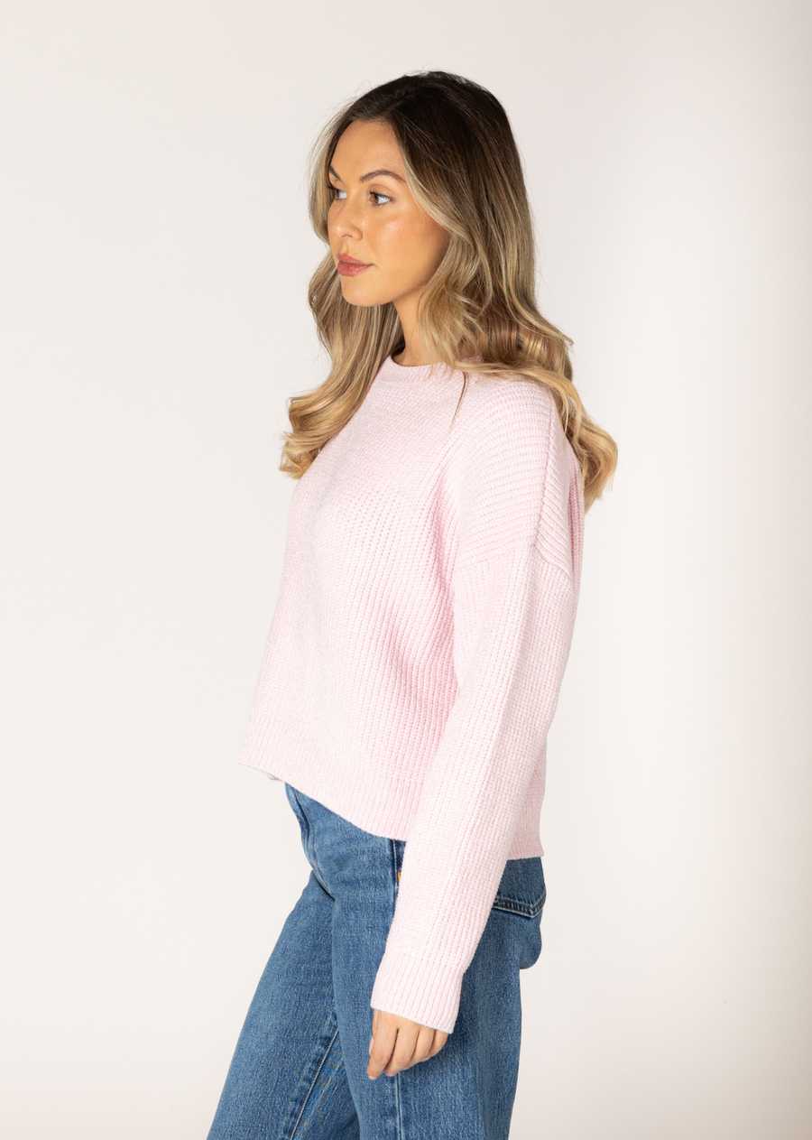Add texture, warmth, and a serious dose of fashion this season with our must-have chenille textured sweater. The pretty pastel hues make this an easy go-to for weekend and casual outfits. Its luxurious, soft handfeel provides unparalleled comfort, while the rich texture adds an eye-catching element to any ensemble.