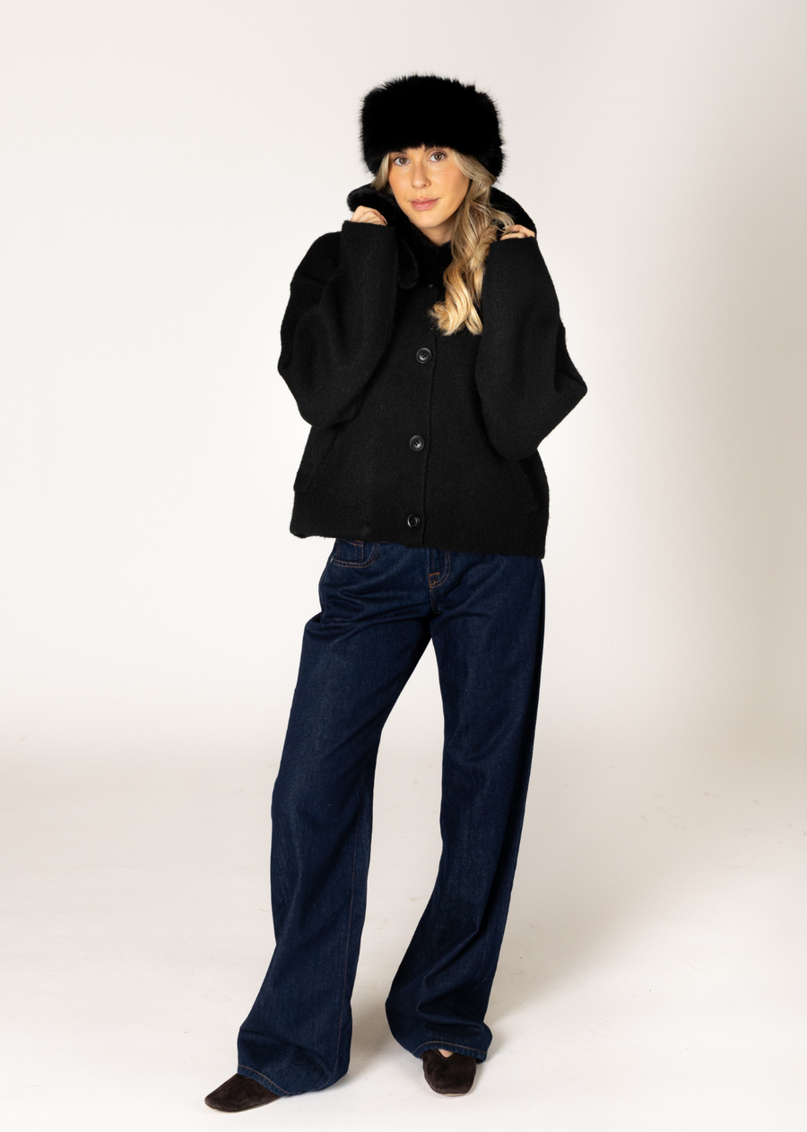 This chic, short coat offers an instant dose of high-impact glamour with its removable, plush eco faux-fur collar. The shortened silhouette provides a flattering, contemporary fit while ensuring maximum warmth. Featuring deep pockets and a soft, luxurious fabrication, this outerwear piece will keep you feeling both polished and cozy all season long.